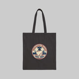 Black tote bag with a baseball-themed logo on a white background