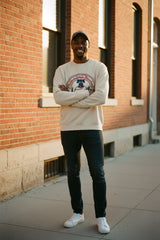 Beige sweatshirt with a graphic design on a white background