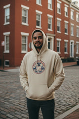 Beige hoodie with text design on a white background