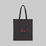 Black tote bag with a logo on a white background