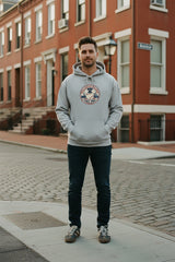 Gray hoodie with colorful 'LA28' logo on a white background